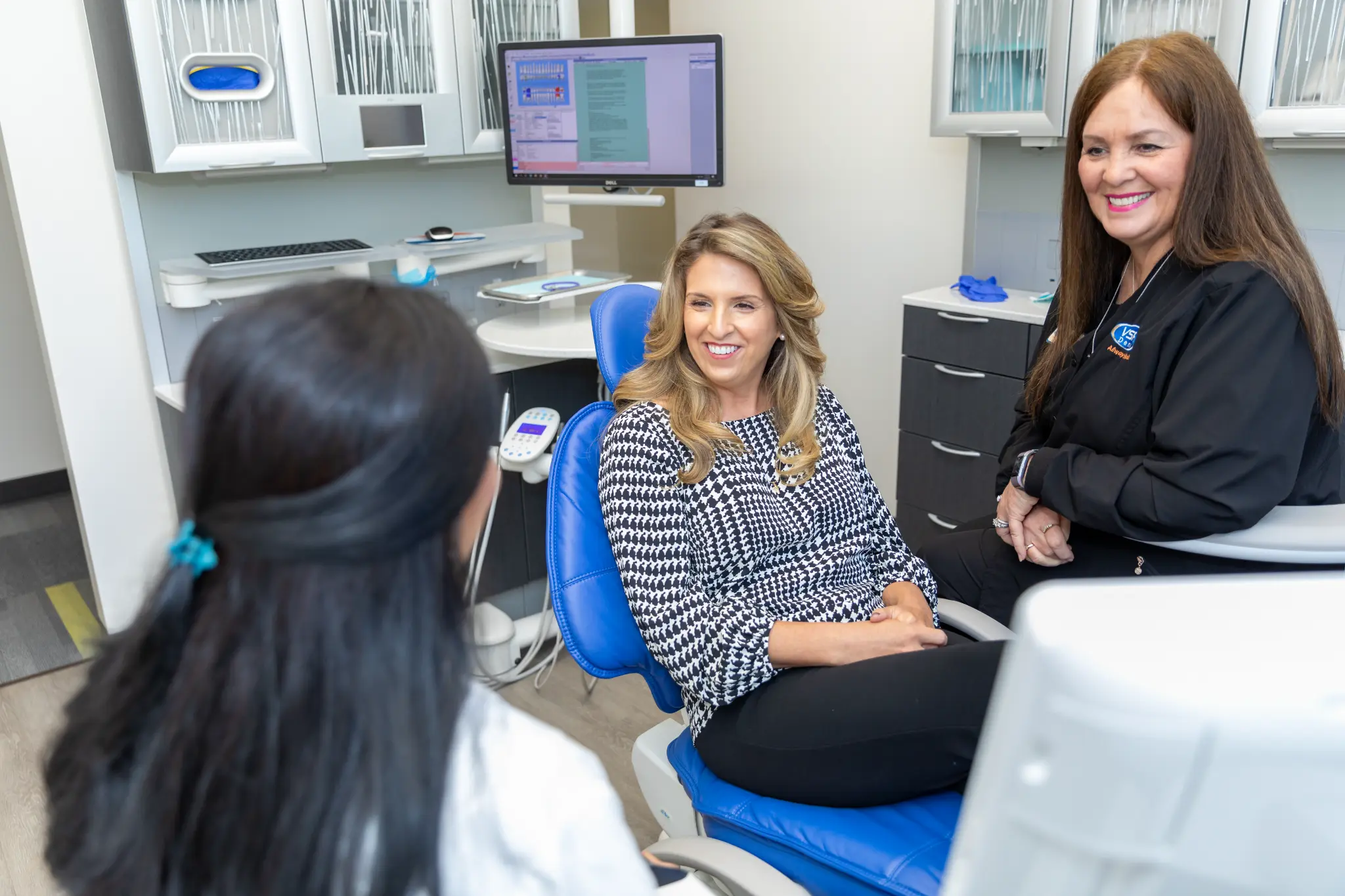 VSP Dental clinicians meeting with a patient during a sleep-apnea treatment consultation